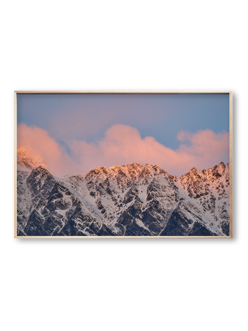 Cloud Ridge fine art landscape print featuring snow-covered New Zealand mountains and foggy alpine terrain. Moody Queenstown photography wall art, perfect for winter interiors. Premium giclée print on archival paper. Ideal for modern home décor, minimalist design, and Scandinavian-style spaces. Available from Melbourne Print Studio, part of the Snowdrift Collection.