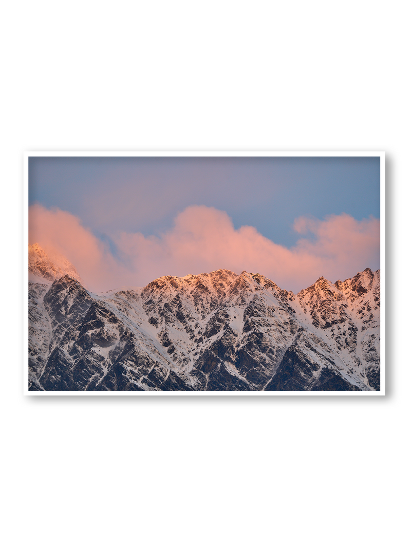 Cloud Ridge fine art landscape print featuring snow-covered New Zealand mountains and foggy alpine terrain. Moody Queenstown photography wall art, perfect for winter interiors. Premium giclée print on archival paper. Ideal for modern home décor, minimalist design, and Scandinavian-style spaces. Available from Melbourne Print Studio, part of the Snowdrift Collection.