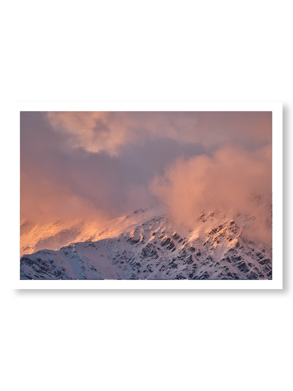 Daybreak fine art landscape print featuring snow-covered New Zealand mountains and foggy alpine terrain. Moody Queenstown photography wall art, perfect for winter interiors. Premium giclée print on archival paper. Ideal for modern home décor, minimalist design, and Scandinavian-style spaces. Available from Melbourne Print Studio, part of the Snowdrift Collection.