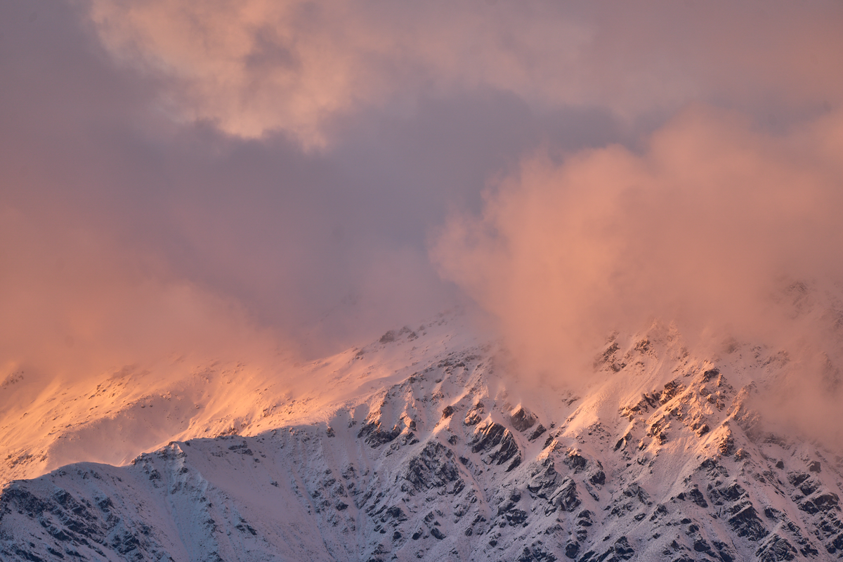 Daybreak fine art landscape print featuring snow-covered New Zealand mountains and foggy alpine terrain. Moody Queenstown photography wall art, perfect for winter interiors. Premium giclée print on archival paper. Ideal for modern home décor, minimalist design, and Scandinavian-style spaces. Available from Melbourne Print Studio, part of the Snowdrift Collection.