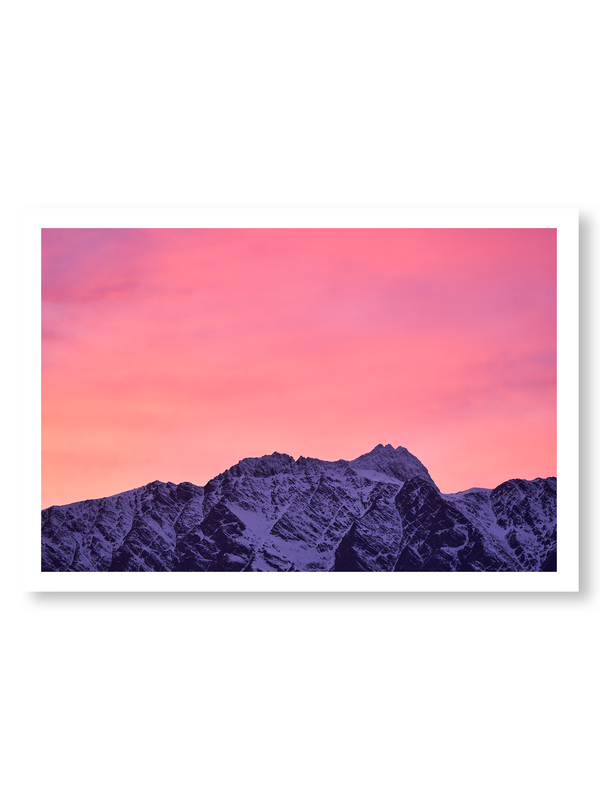 First Light fine art landscape print featuring snow-covered New Zealand mountains and foggy alpine terrain. Moody Queenstown photography wall art, perfect for winter interiors. Premium giclée print on archival paper. Ideal for modern home décor, minimalist design, and Scandinavian-style spaces. Available from Melbourne Print Studio, part of the Snowdrift Collection.