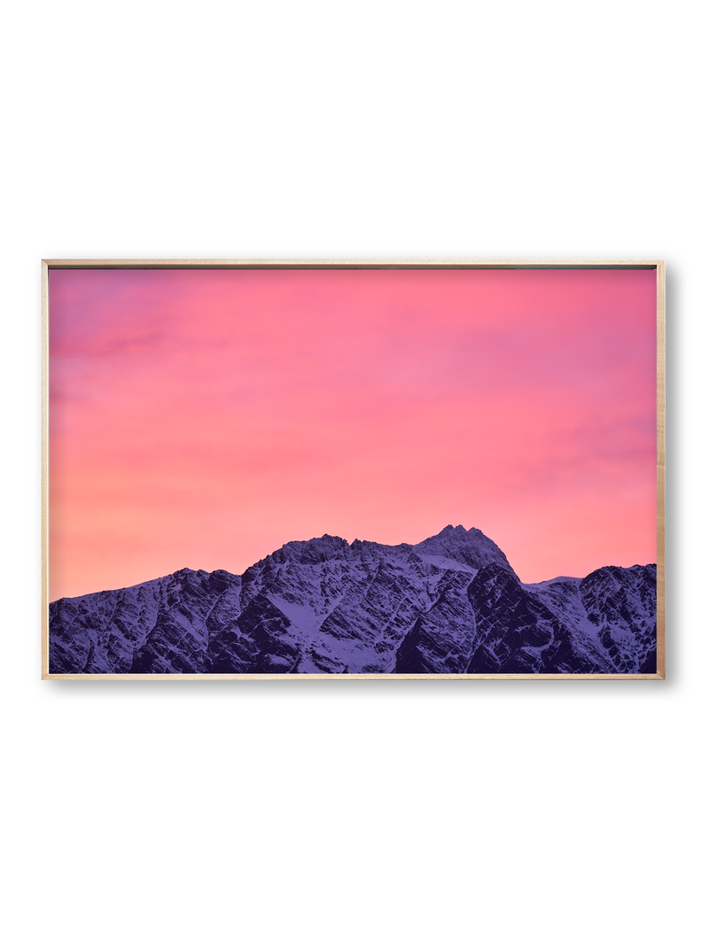 First Light fine art landscape print featuring snow-covered New Zealand mountains and foggy alpine terrain. Moody Queenstown photography wall art, perfect for winter interiors. Premium giclée print on archival paper. Ideal for modern home décor, minimalist design, and Scandinavian-style spaces. Available from Melbourne Print Studio, part of the Snowdrift Collection.
