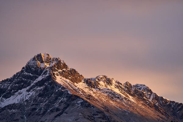 Last Light fine art landscape print featuring snow-covered New Zealand mountains and foggy alpine terrain. Moody Queenstown photography wall art, perfect for winter interiors. Premium giclée print on archival paper. Ideal for modern home décor, minimalist design, and Scandinavian-style spaces. Available from Melbourne Print Studio, part of the Snowdrift Collection.