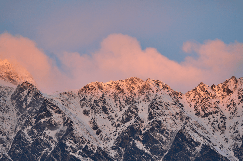 Cloud Ridge fine art landscape print featuring snow-covered New Zealand mountains and foggy alpine terrain. Moody Queenstown photography wall art, perfect for winter interiors. Premium giclée print on archival paper. Ideal for modern home décor, minimalist design, and Scandinavian-style spaces. Available from Melbourne Print Studio, part of the Snowdrift Collection.