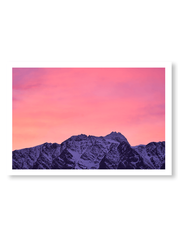 First Light fine art landscape print featuring snow-covered New Zealand mountains and foggy alpine terrain. Moody Queenstown photography wall art, perfect for winter interiors. Premium giclée print on archival paper. Ideal for modern home décor, minimalist design, and Scandinavian-style spaces. Available from Melbourne Print Studio, part of the Snowdrift Collection.
