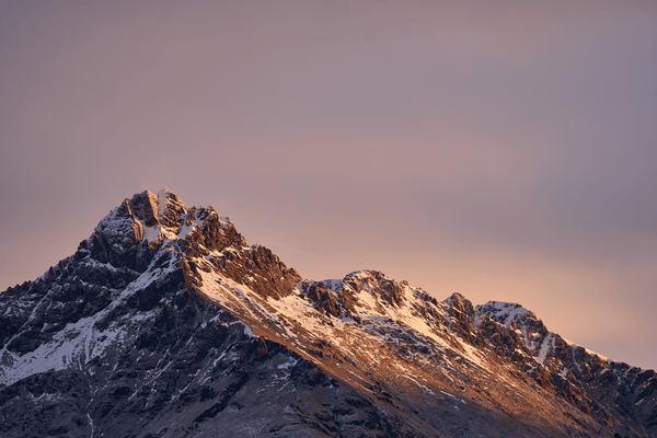 Last Light fine art landscape print featuring snow-covered New Zealand mountains and foggy alpine terrain. Moody Queenstown photography wall art, perfect for winter interiors. Premium giclée print on archival paper. Ideal for modern home décor, minimalist design, and Scandinavian-style spaces. Available from Melbourne Print Studio, part of the Snowdrift Collection.
